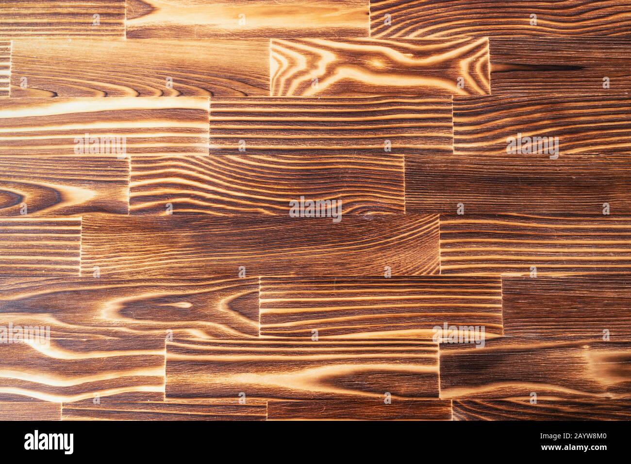 Brown burned and unpainted natural wood with grains for background and texture Stock Photo