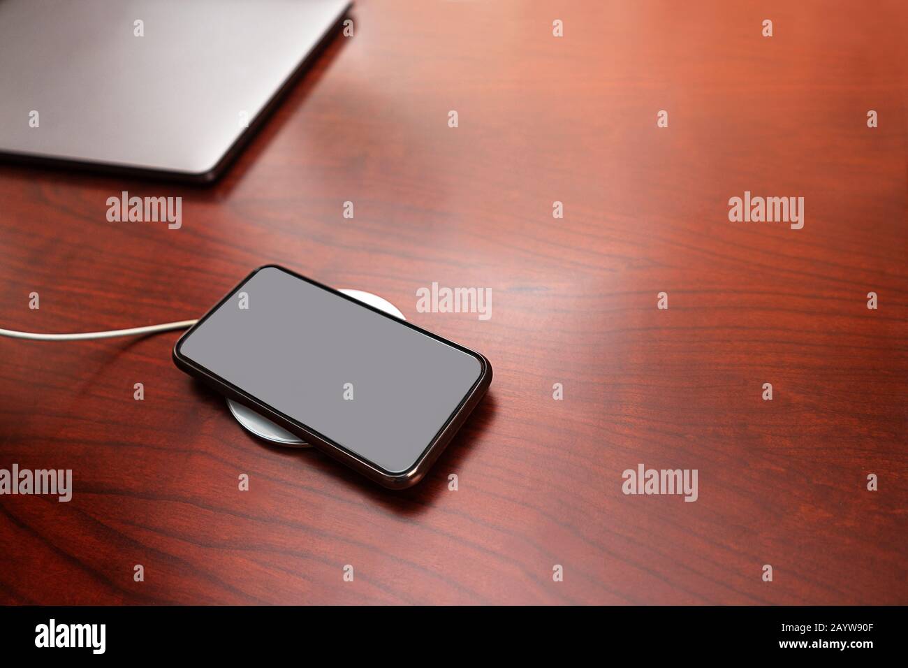 Mobile smart phone charging wirelessly by sharing battery via device