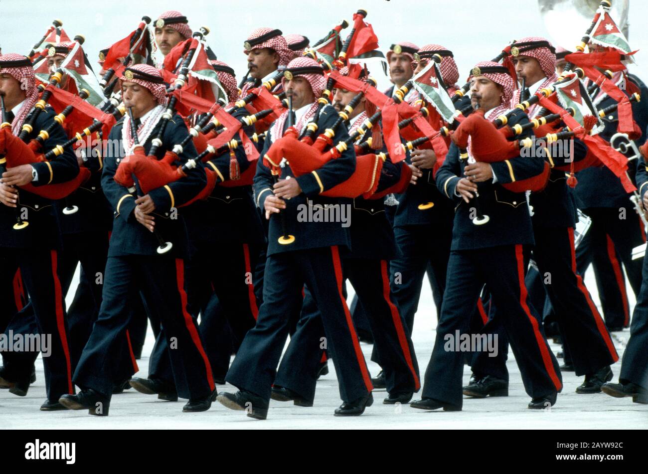 The Royal Jordanian army play bagpipes for the arrival of Queen