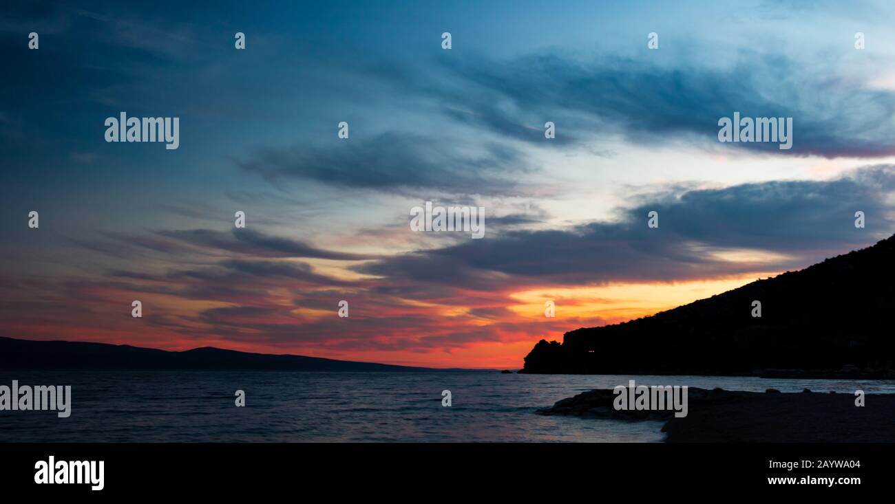 Beautiful sunset at the beach Stock Photo - Alamy