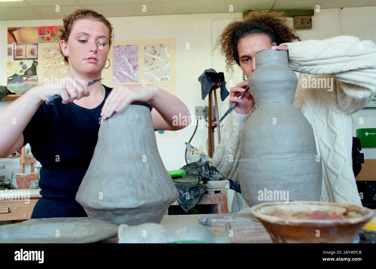Art students making pots Stock Photo Alamy