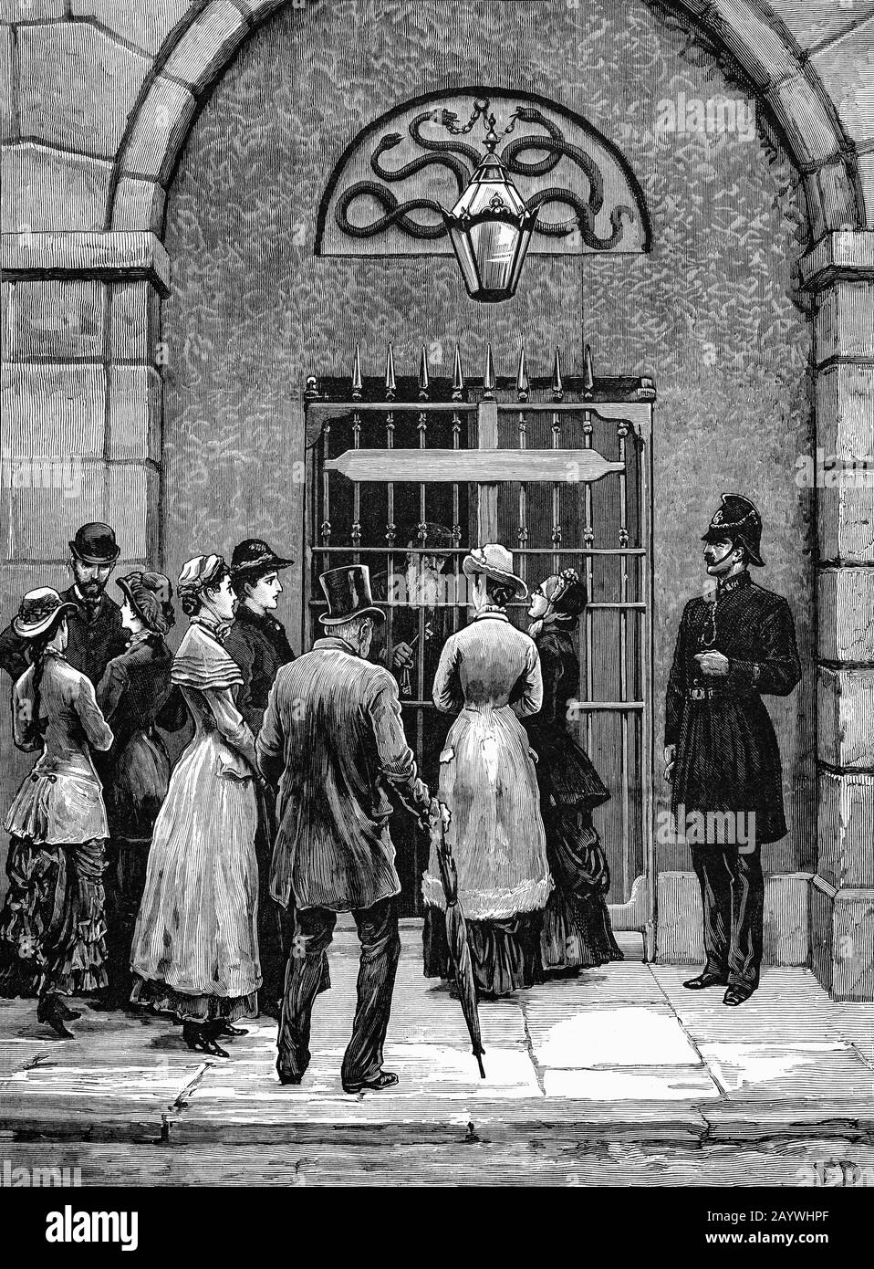 Visitors outside the entrance to Kilmainham Jail, in Dublin, Ireland at the time of the incarceration of Charles Stewart Parnell (1846-1891), Irish nationalist politician who served as Leader of the Irish Parliamentary Party from 1882 to 1891 and Leader of the Home Rule League from 1880 to 1882. When Parnell's own newspaper, the United Ireland, attacked the Land Actand he was arrested on 13 October 1881, together with his party lieutenants and imprisoned under a proclaimed Coercion Act for "sabotaging the Land Act",  signed by Parnell calling for a national tenant farmer rent strike. Stock Photo