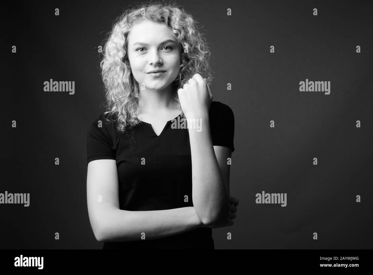 Girl with curly blond hair hi-res stock photography and images - Alamy