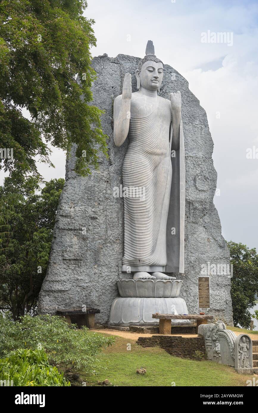 Polonnaruwa, Sri Lanka: 03/17/2020: The Gal Vihara rock temple with four Buddha figures carved into the rock face. Stock Photo