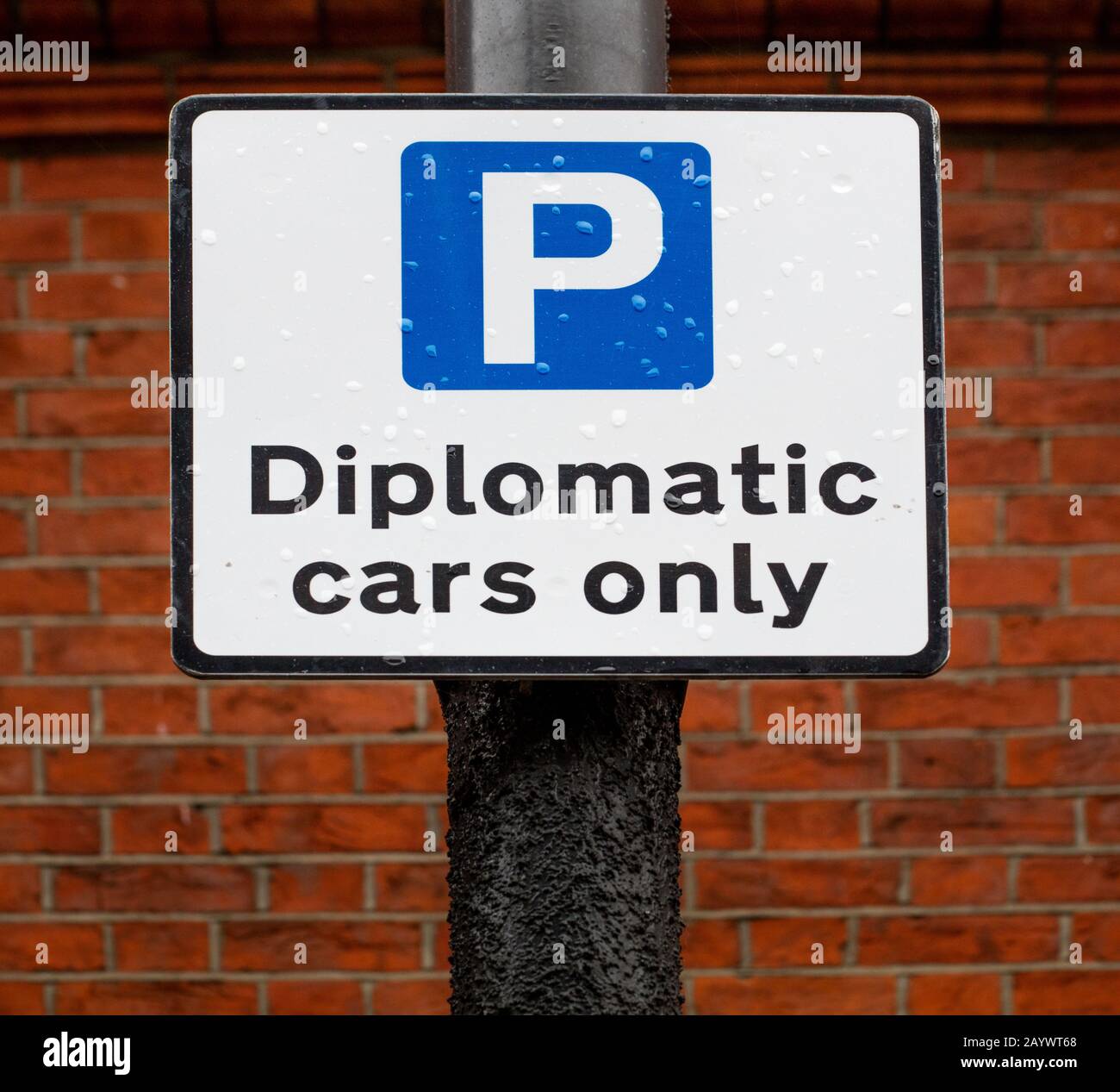 Street sign in South Kensington, centre of embassies and consulates, indicating parking space only for diplomatic cars Stock Photo