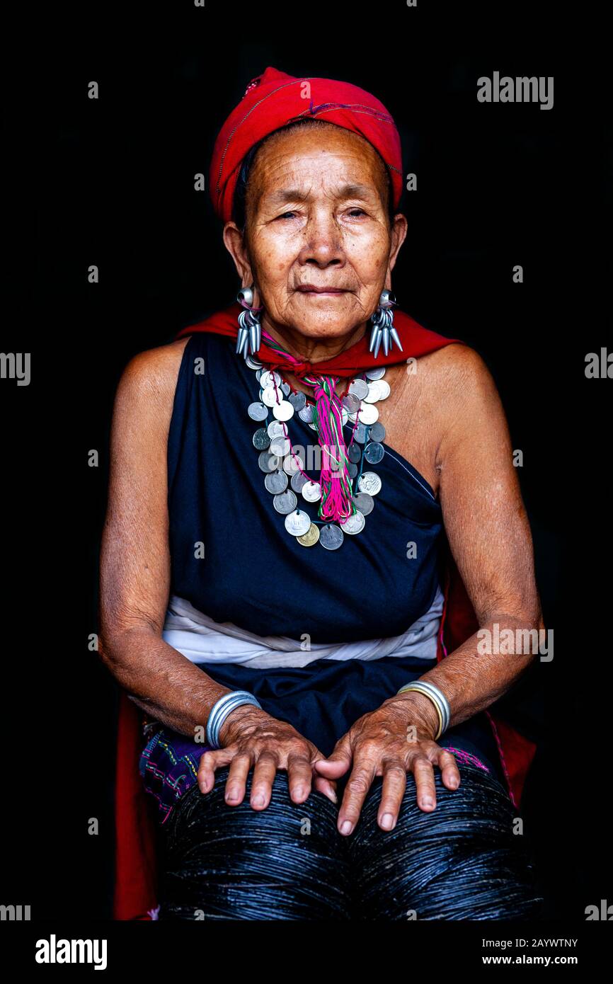 A Senior Woman From The Kayah Ethnic Group In Traditional Costume, Hta Nee La Leh Village, Loikaw, Kayah State, Myanmar. Stock Photo