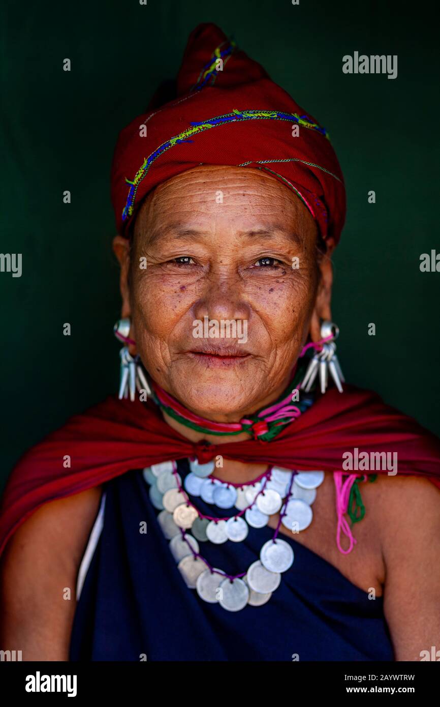 A Portrait Of A Woman From The Kayah Ethnic Group In Traditional Costume, Hta Nee La Leh Village, Loikaw, Kayah State, Myanmar. Stock Photo