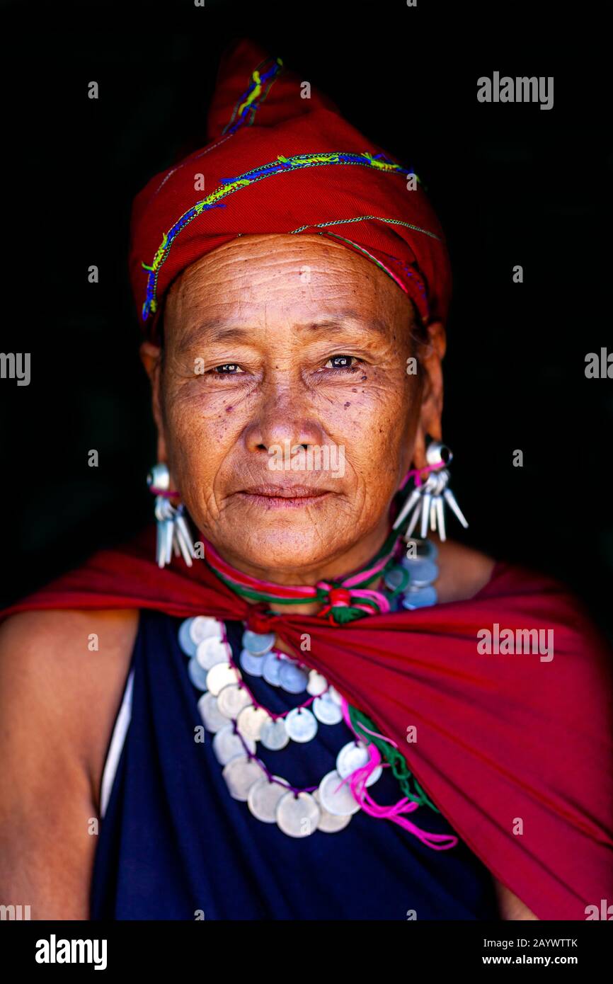 A Portrait Of A Woman From The Kayah Ethnic Group In Traditional Costume, Hta Nee La Leh Village, Loikaw, Kayah State, Myanmar. Stock Photo