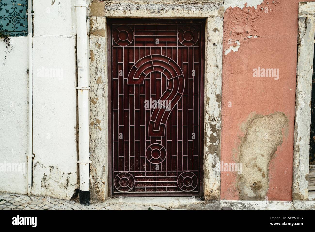 Ornamental door grille with question mark Stock Photo Alamy
