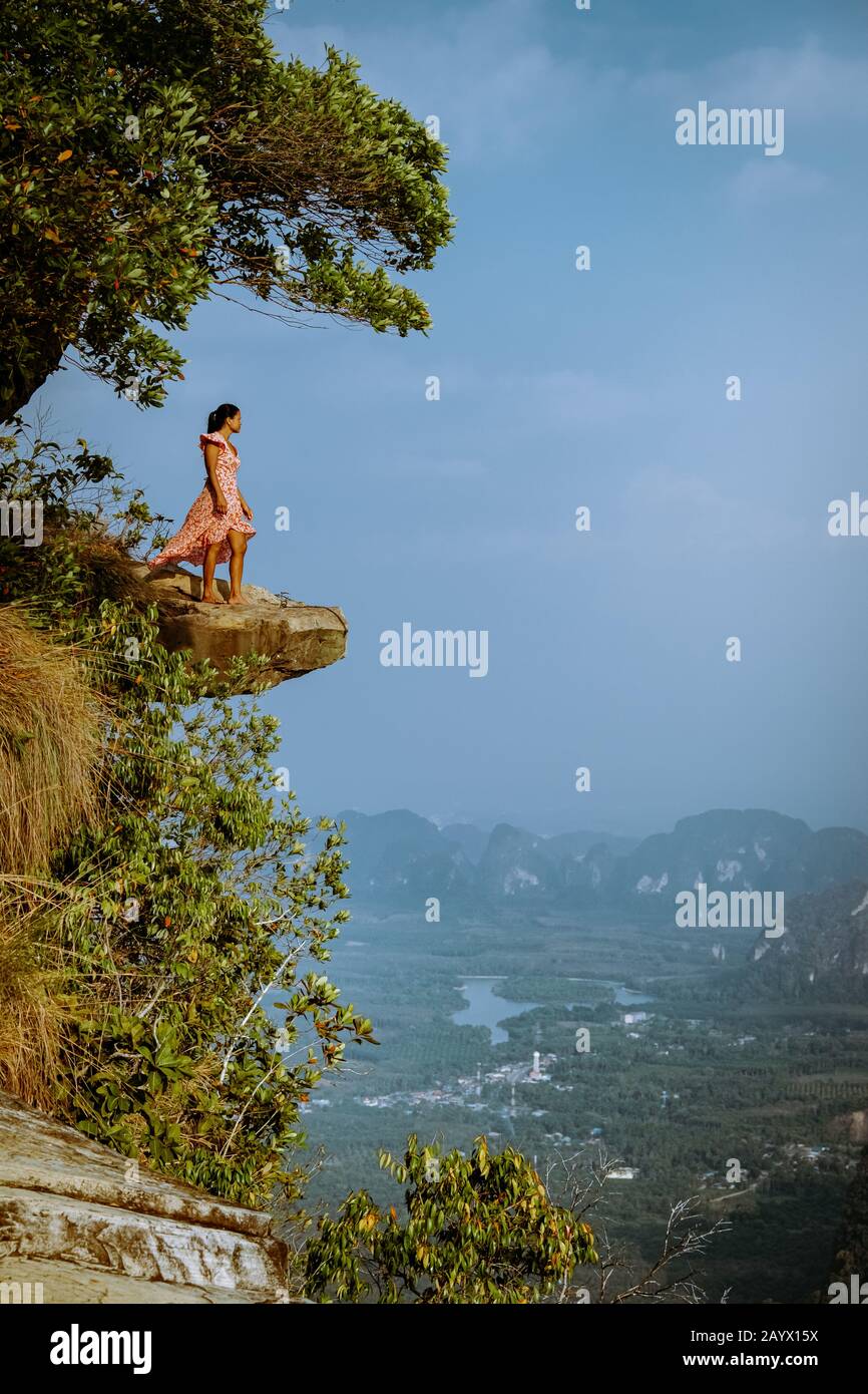 Khao Ngon Nak Nature Trail Krabi Thailand or Dragon Crest,woman climbed to a viewpoint on the top of a mountain in Krabi, Thailand Stock Photo