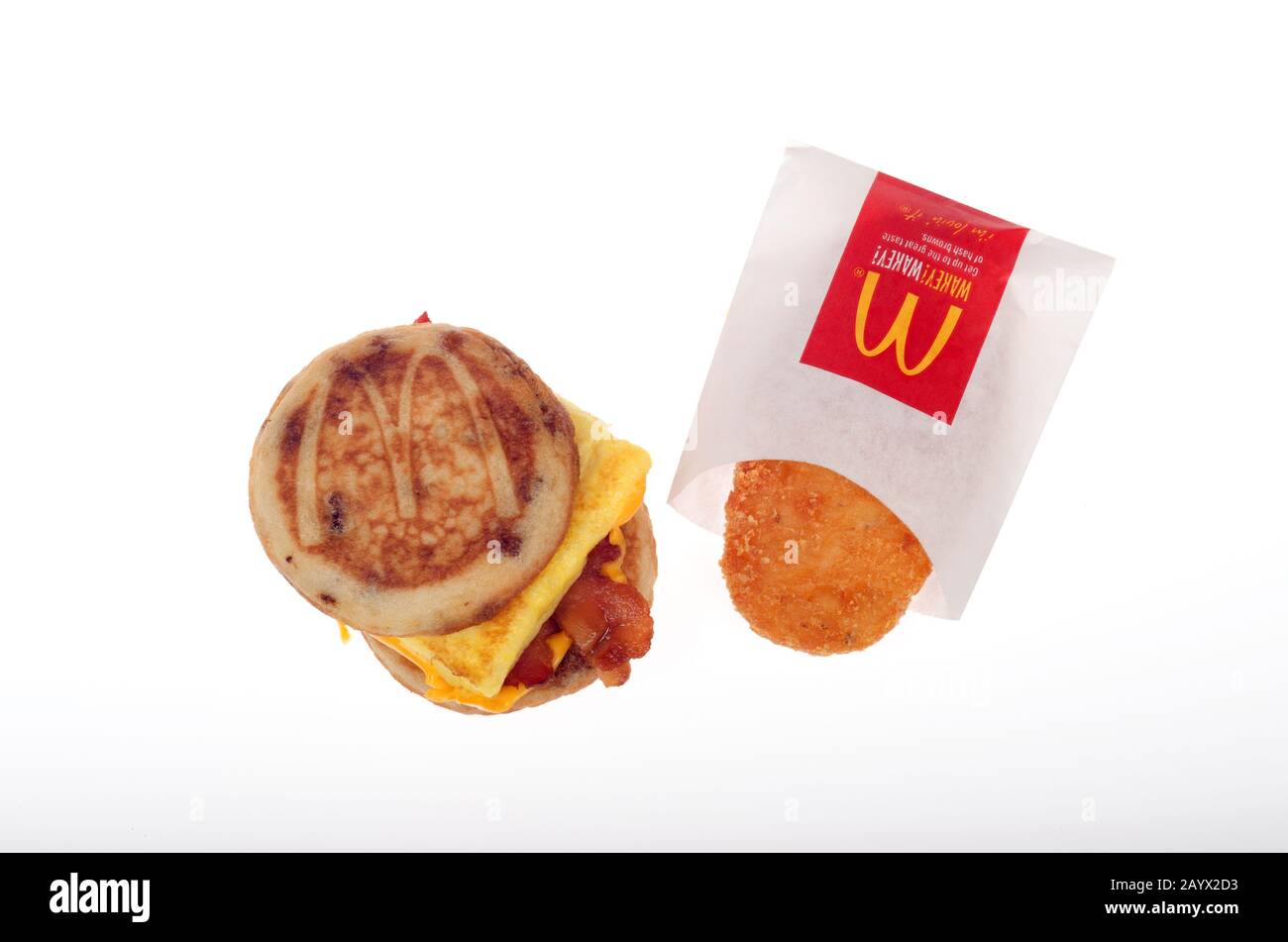 McDonalds McGriddle egg, cheese and bacon breakfast sandwich with hash