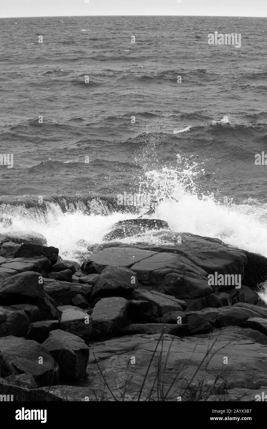 Waves crashing to shore Black and White Stock Photos & Images - Alamy