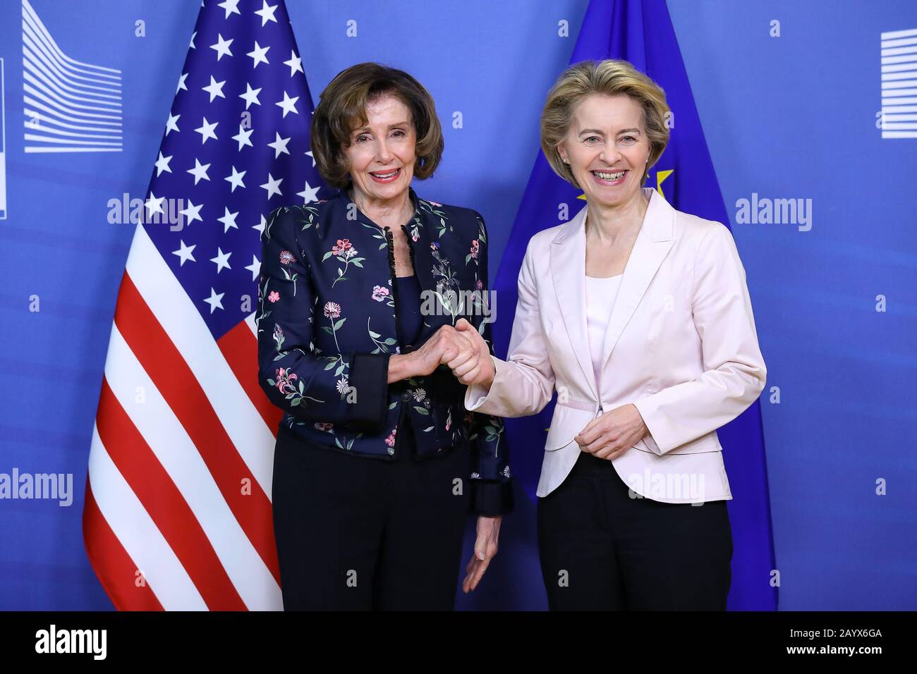 Brussels, Belgium. 17th Feb, 2020. European Commission President Ursula Von der Leyen (R) shakes hands with U.S. House Speaker Nancy Pelosi as the latter pays a visit to the EU headquarters in Brussels, Belgium, Feb. 17, 2020. Credit: Zhang Cheng/Xinhua/Alamy Live News Stock Photo