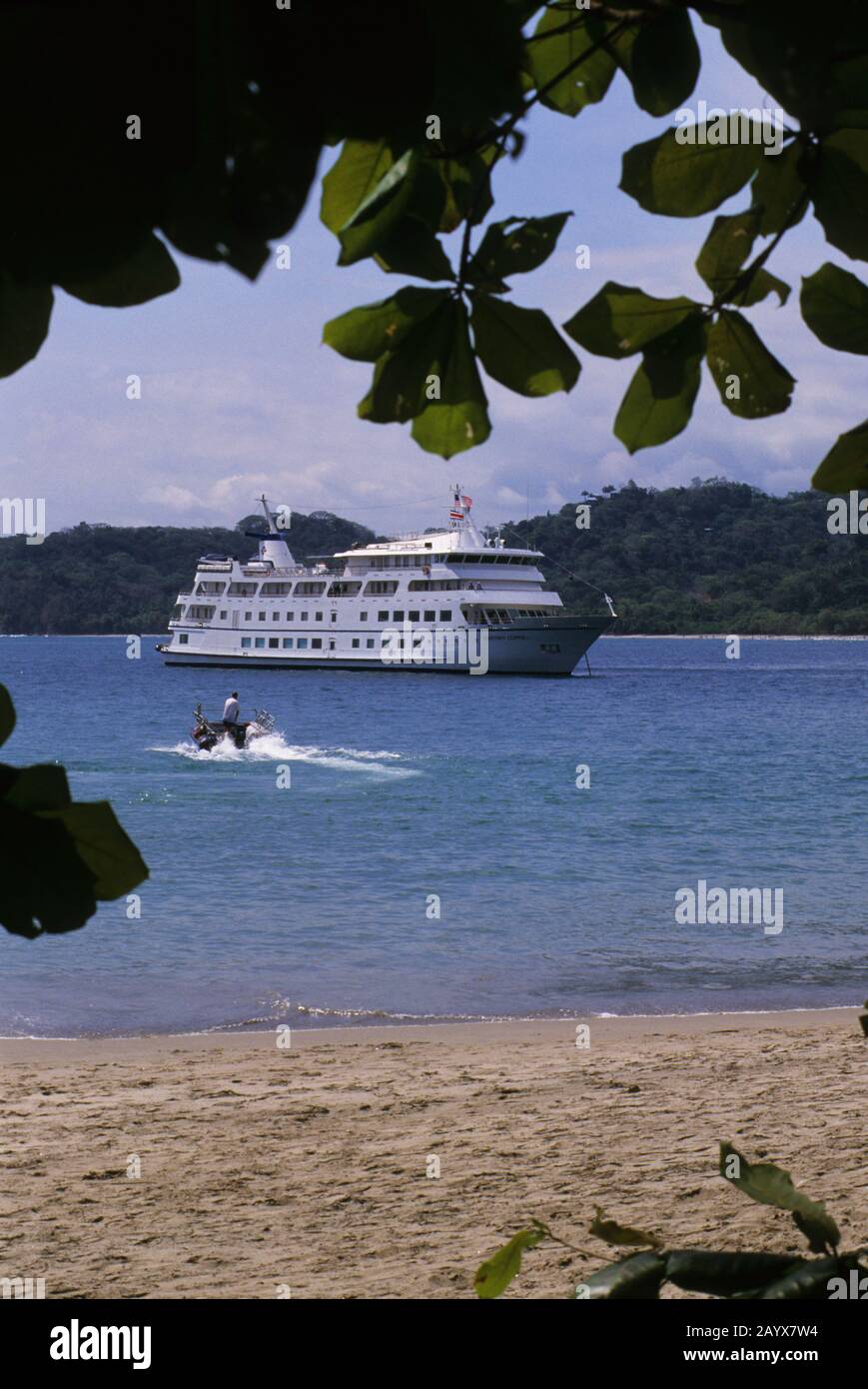 Cruise ship Americana (former Yorktown Clipper) at anchor in front of Manuel Antonio National Park in Costa Rica. Stock Photo