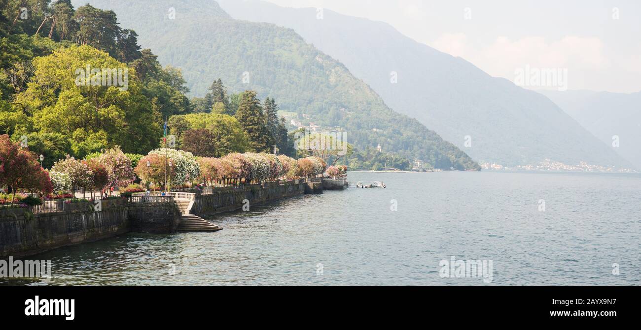 Bellagio Embankment on Lake Como. Lombardy. Italy. Beautiful Landscape with Mountains. Stock Photo
