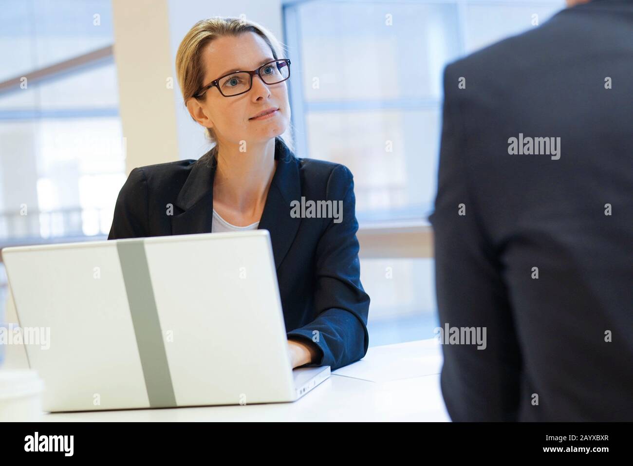Executive people working on laptop in meeting room Stock Photo - Alamy
