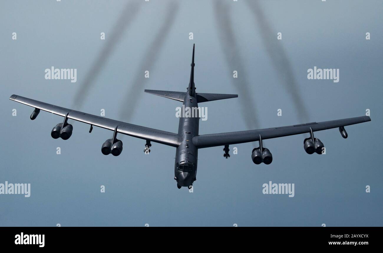 A U.S. Air Force B-52H Stratofortress strategic bomber soars across the Qatar skies near Al Udeid Air Base May 21, 2019 in Qatar. Stock Photo