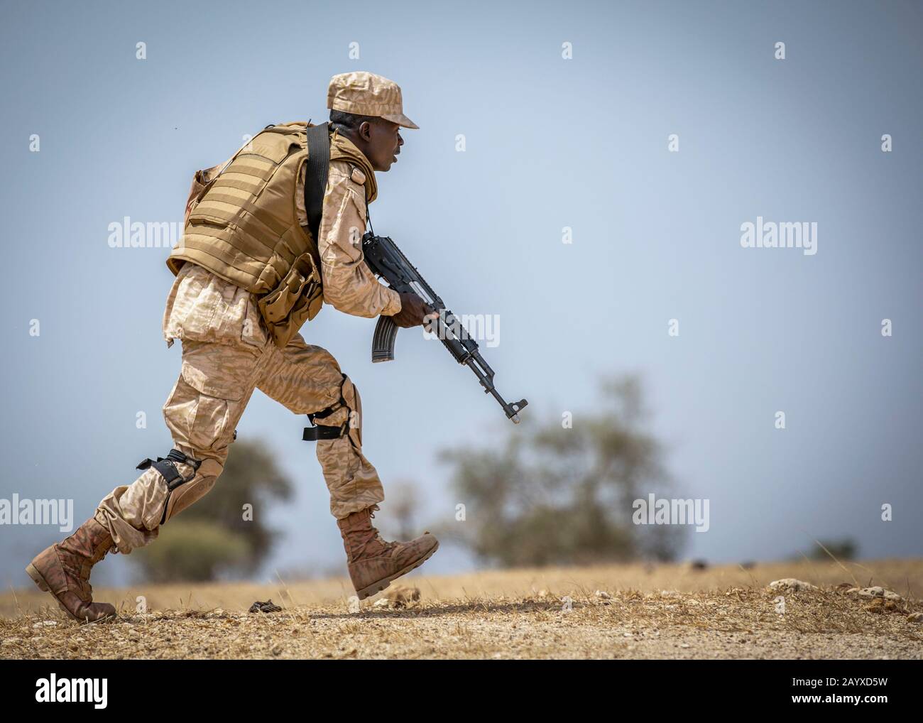 Thies, Senegal. 16th Feb, 2020. A Burkinabe Soldier rushes to a fighting position during a training patrol at Flintlock 20 February 16, 2020 near Thies, Senegal. Flintlock is the largest annual Special Operations Forces exercise in Africa involving U.S and Allied troops and African partner nations. Credit: Miguel Pena/Planetpix/Alamy Live News Credit: Planetpix/Alamy Live News Stock Photo