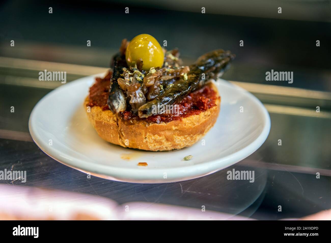 Typical tapa montadito appetizer served in a bar, Barcelona, Catalonia