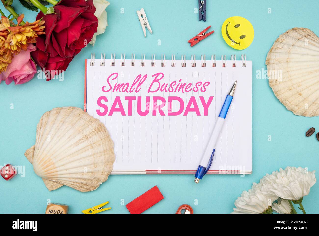 Female Small Business Sationery in pink with fashion items on table Stock Photo