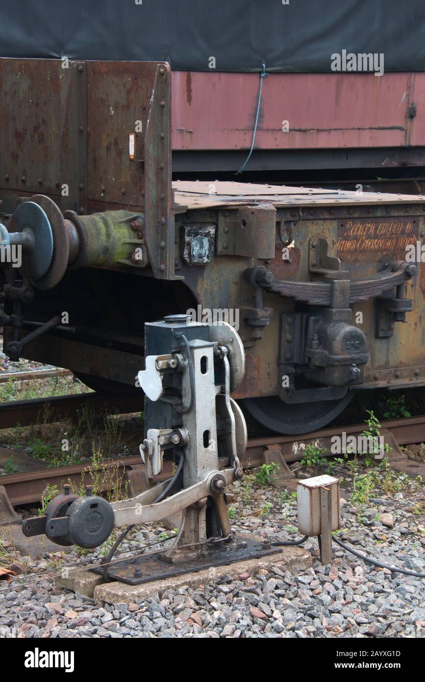 an old flatbed truck awaiting restoration in a siding at Minehead station on the West Somerset Railway. Stock Photo