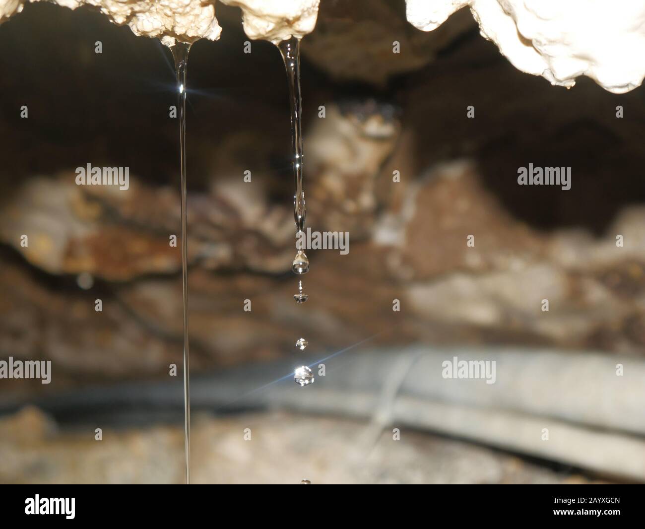 St. Beatus Cave, Switzerland: A water drop falling Stock Photo