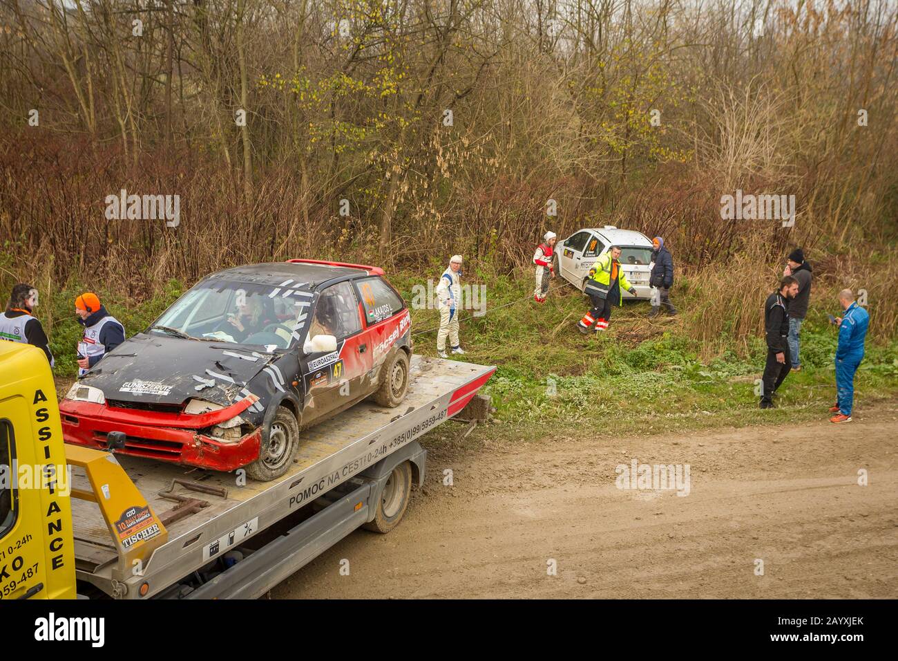 Sveta Nedjelja, Croatia - November 24, 2019. 10th Rally Show Santa Domenica. Towing service truck with a crashed car pulls out Luca Grando and Luca Da Stock Photo