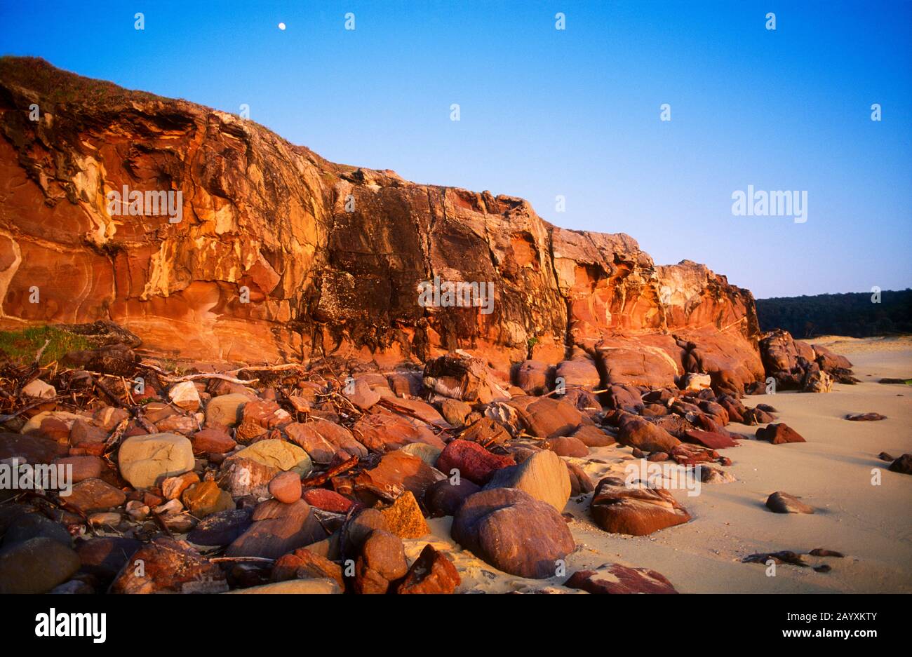 Rocky beach at dawn, Short Point, South coast of New South Wales,  Merimbula, NSW, Australia Stock Photo
