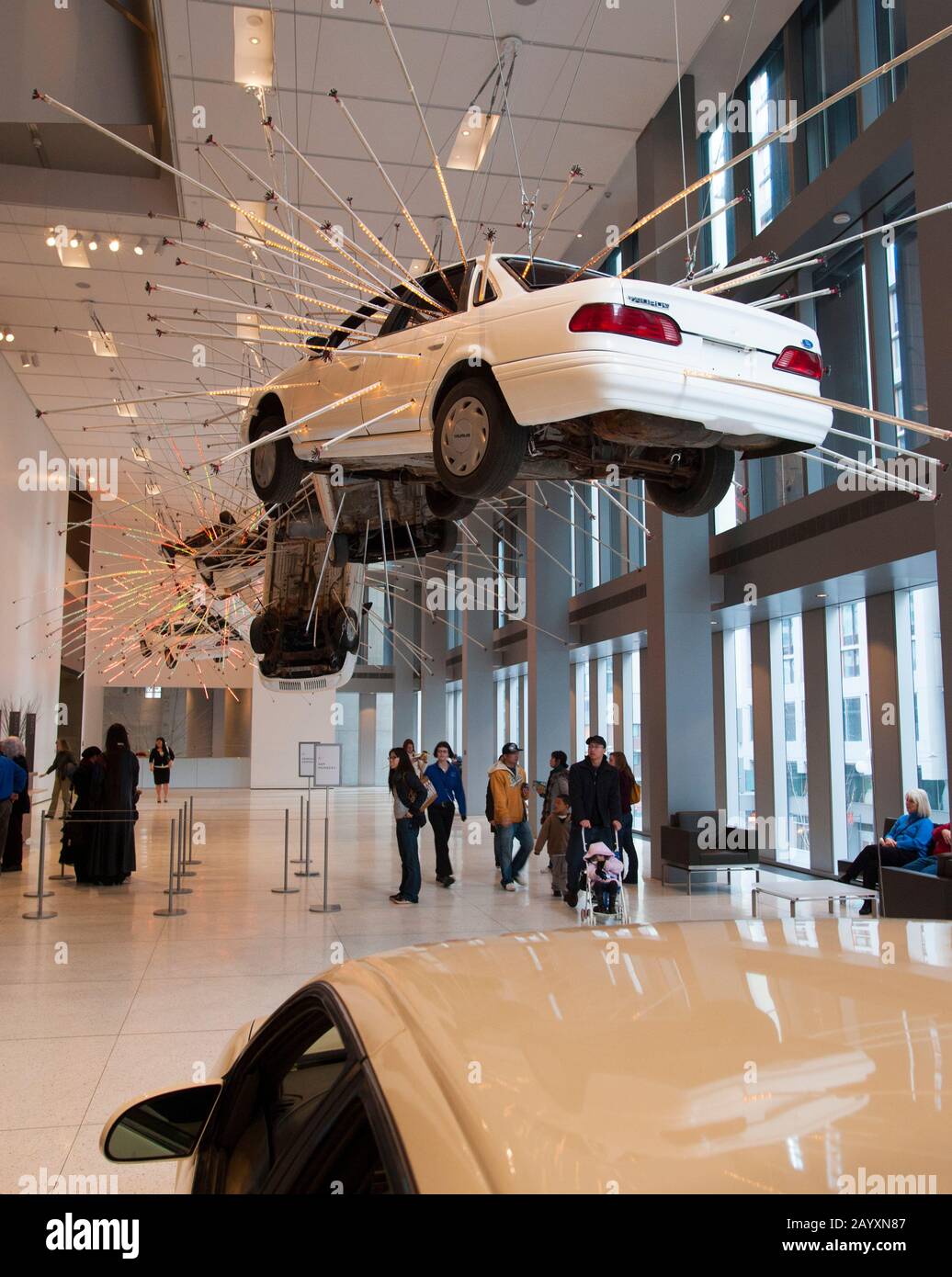 Inopportune: Stage One, from 2004, is a large-scale installation work consisting of a meticulous arrangement of life-size cars and multichannel tubes Stock Photo