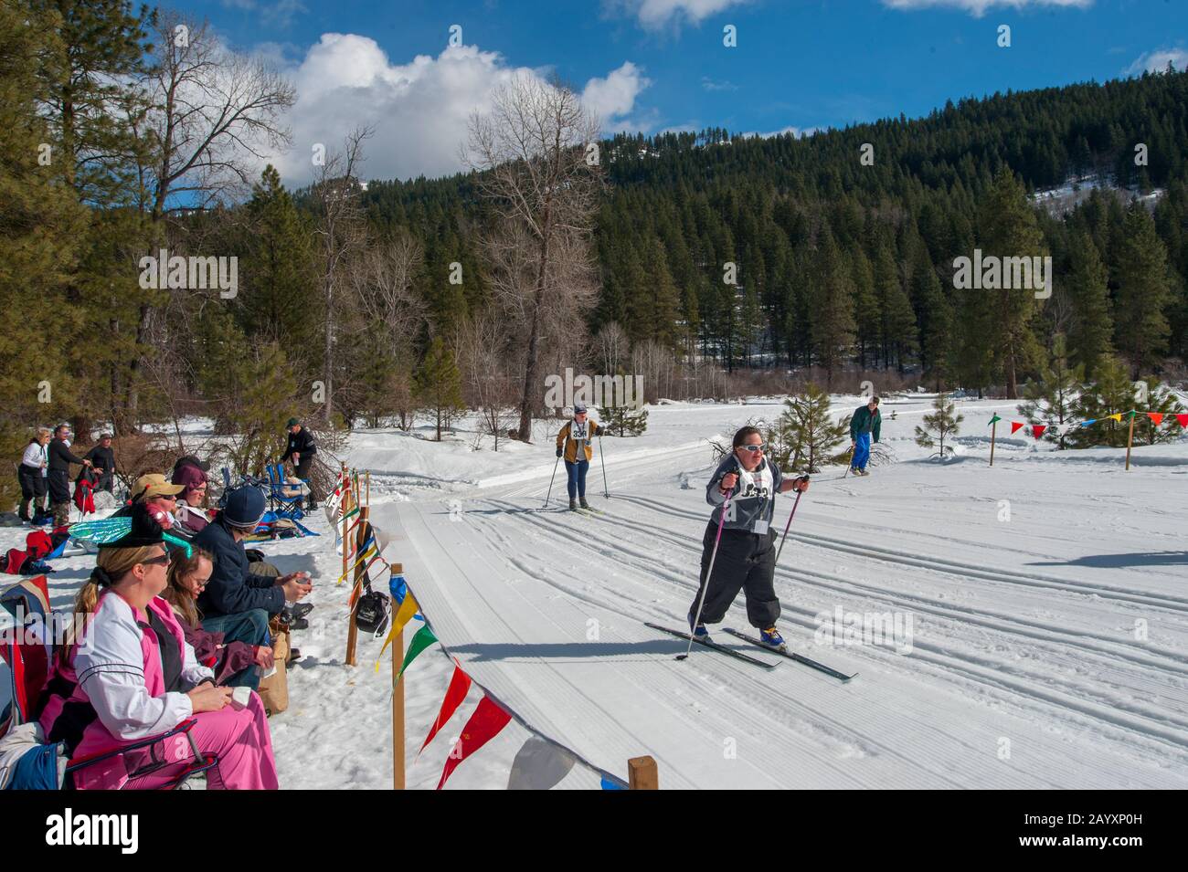 People with disabilities are cross country skiing during a Special