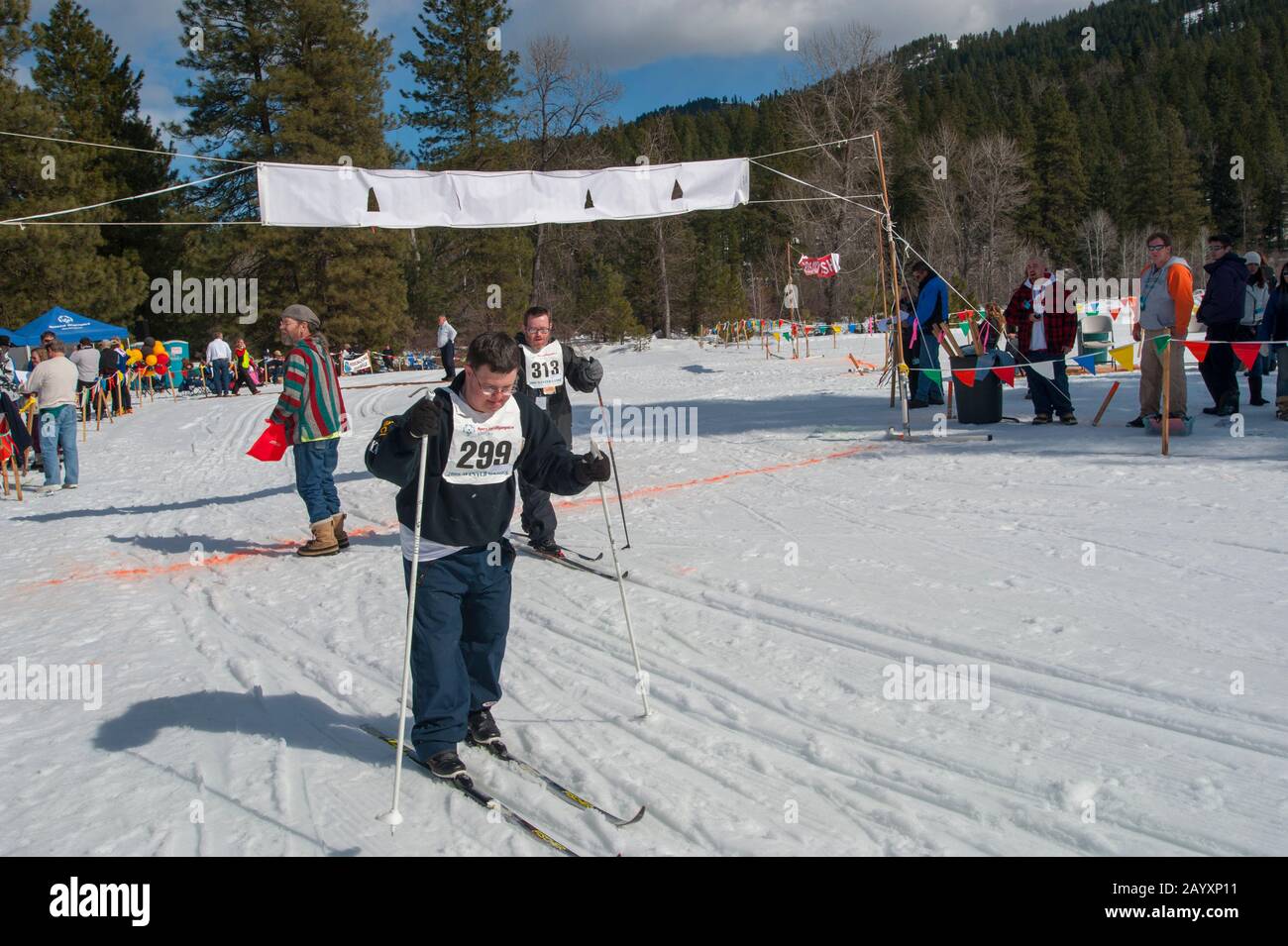 People with disabilities are cross country skiing during a Special
