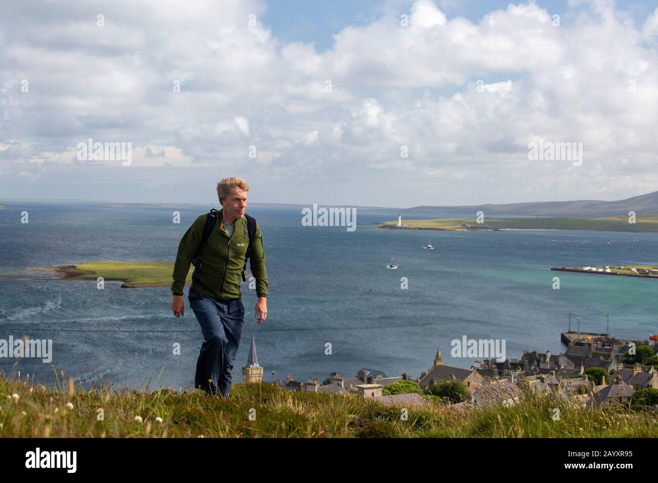 Orkney, Scotland, UK - walker on top of Brinkies Brae  above Stromness on Orkney Mainland Stock Photo