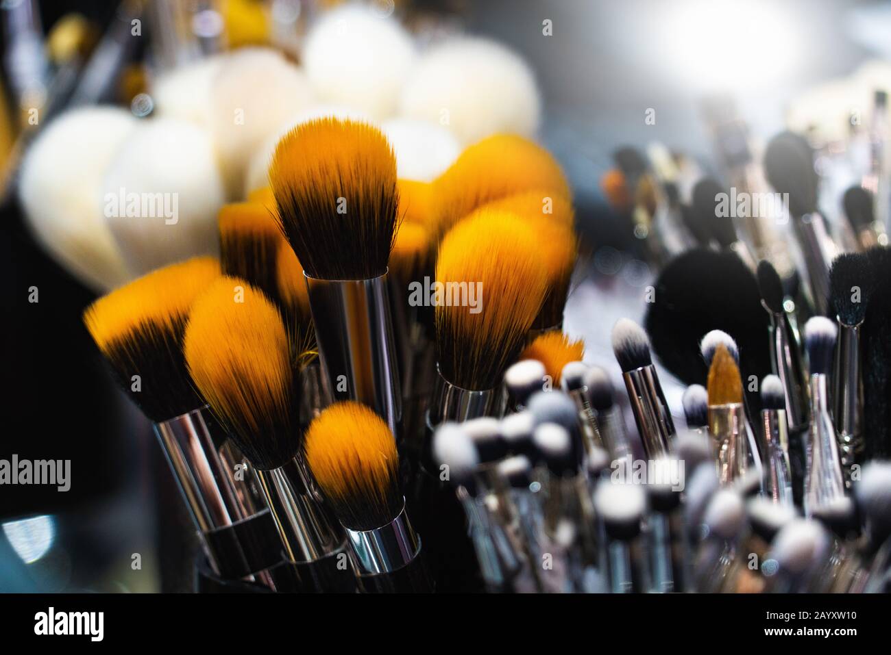 A collection of natural wool brushes for applying cosmetics, close-up. Stock Photo