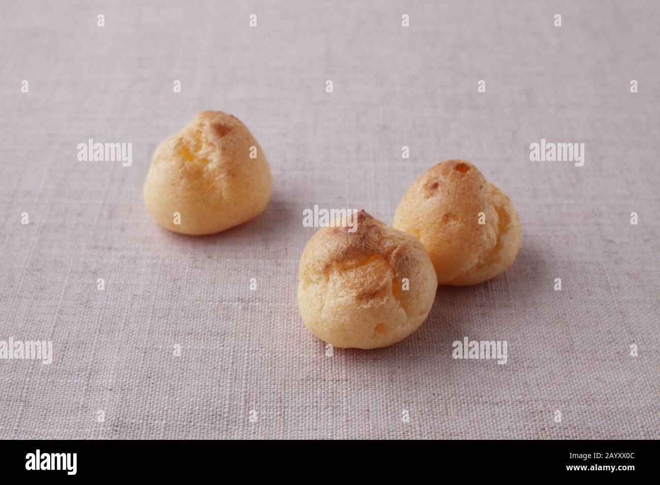 cream puffs closeup isolated on table cloth Stock Photo