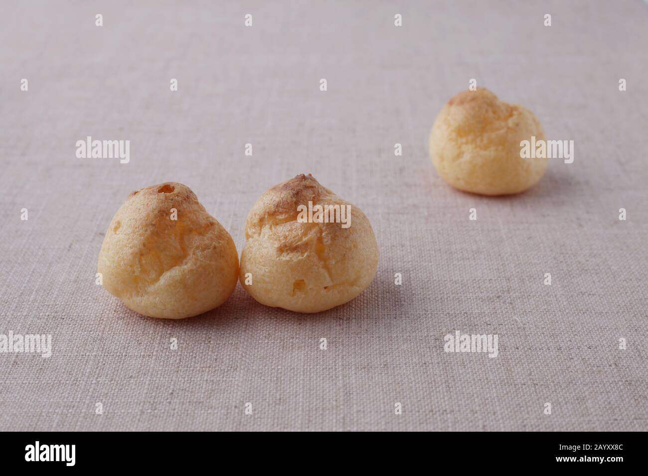 cream puffs closeup isolated on table cloth Stock Photo