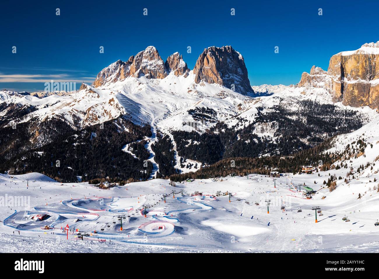 Dolomity superski mountain resort with torri del sella, piz boe and sella ronda, Canazei, Italy, Europe. Stock Photo