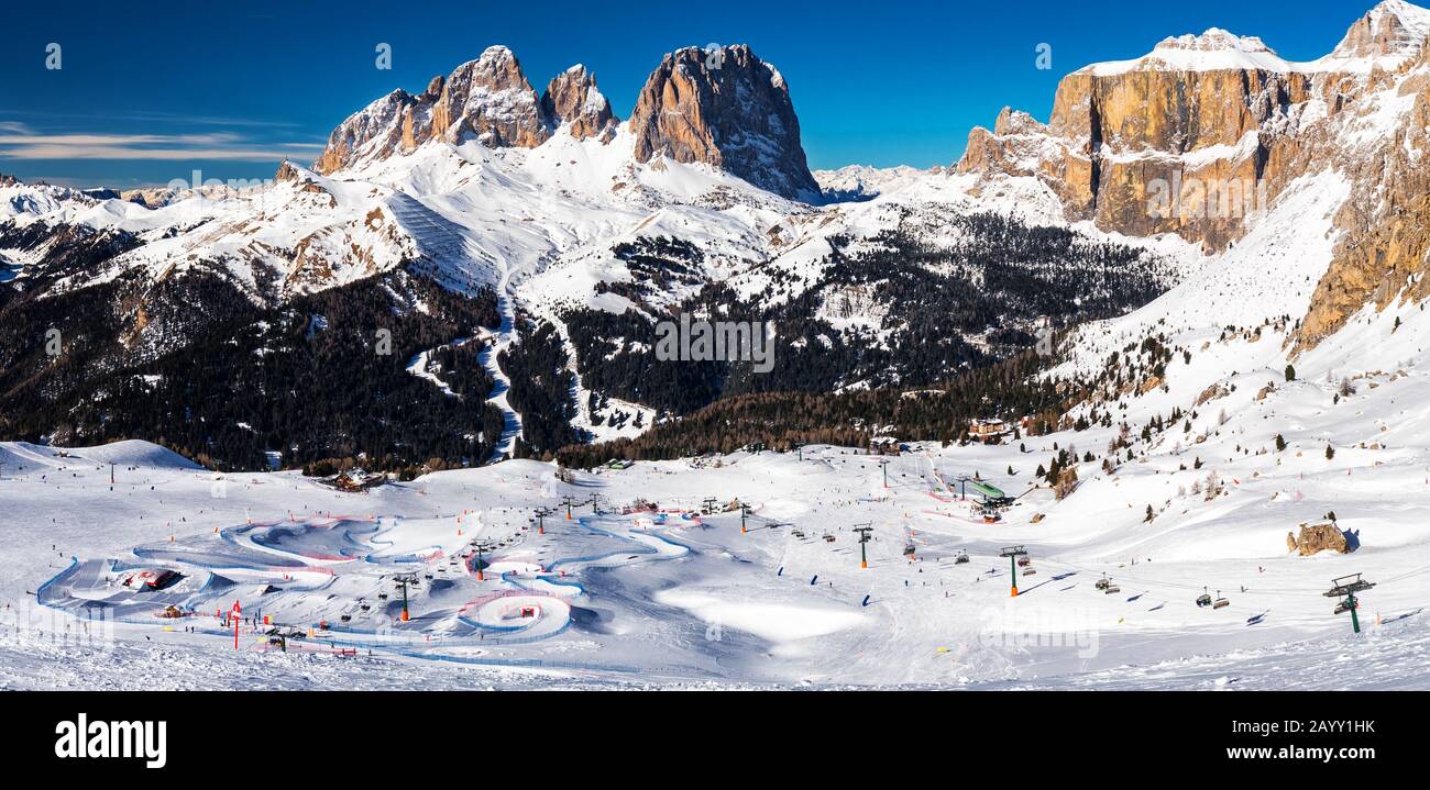 Dolomity superski mountain resort with torri del sella, piz boe and sella ronda, Canazei, Italy, Europe. Stock Photo