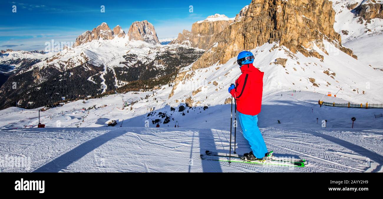 Young man ready for skiing in Dolomity super ski resort, Italy. Stock Photo