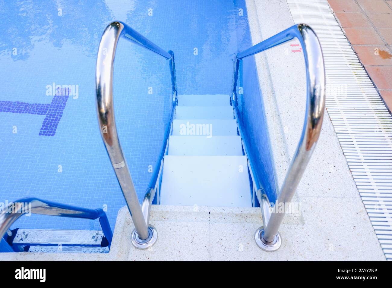 Stairs to enter and exit a pool Stock Photo Alamy