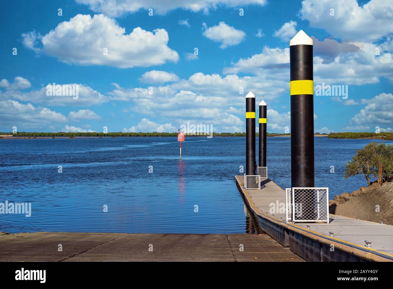 Floating fishing pontoon at a boat ramp on the river close to the city ...