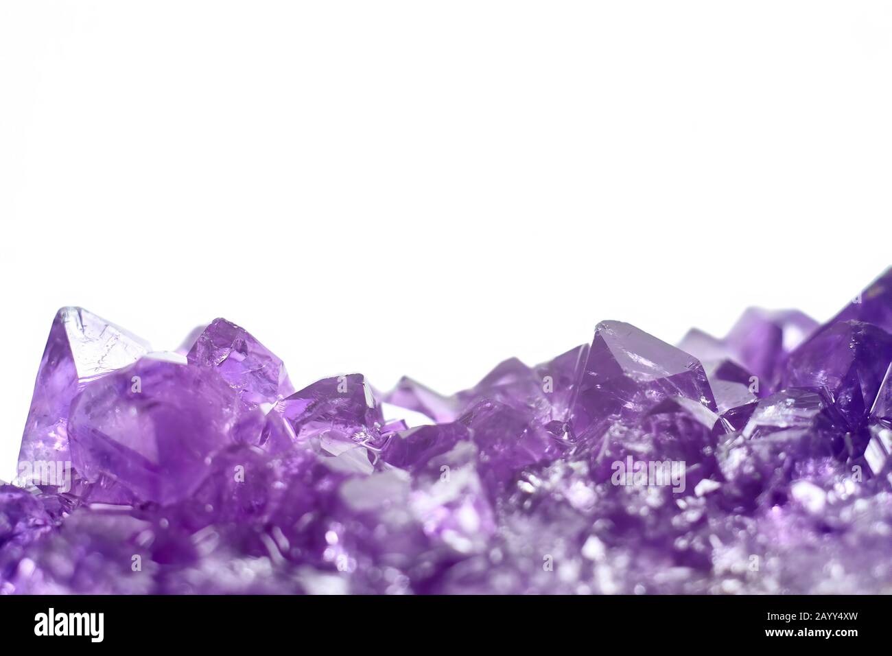 Amethyst crystals geode isolated on white background. Stock photo Stock