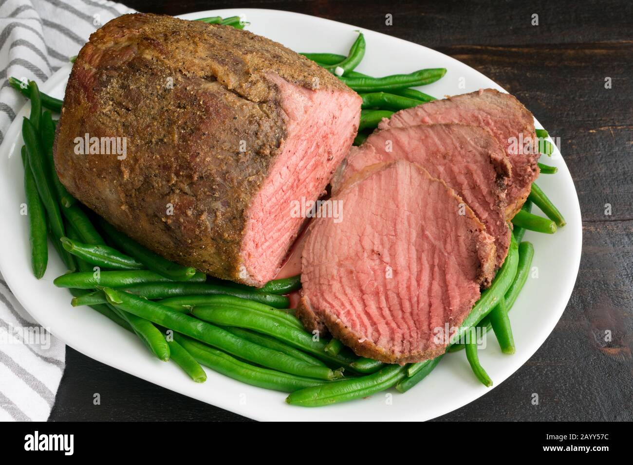 Medium Rare Roast Beef with Green Beans Sliced medium rare roasted