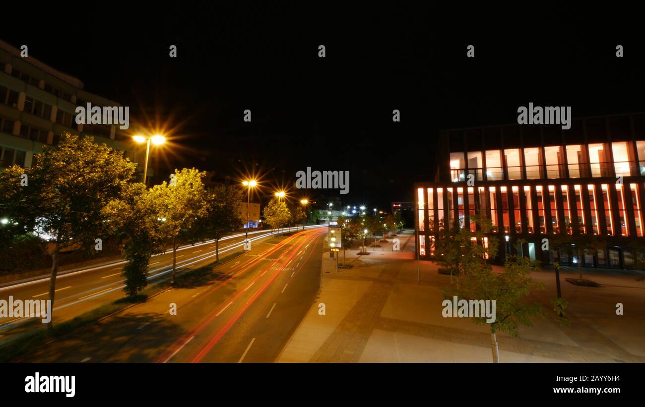 Reutlingen, Germany: Traffic passing by the Stadthalle (concert hall) Stock Photo
