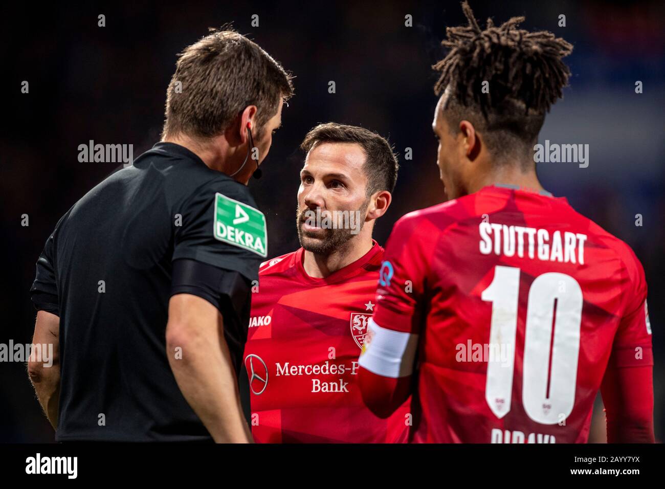 Bochum, Germany. 17th Feb, 2020. Football: 2nd Bundesliga, VfL Bochum - VfB Stuttgart, 22nd matchday, at the Vonovia Ruhr Stadium. Referee Frank Willenborg (l-r) talks to Stuttgart's Gonzalo Castro and Daniel Didavi. Credit: David Inderlied/dpa - IMPORTANT NOTE: In accordance with the regulations of the DFL Deutsche Fußball Liga and the DFB Deutscher Fußball-Bund, it is prohibited to exploit or have exploited in the stadium and/or from the game taken photographs in the form of sequence images and/or video-like photo series./dpa/Alamy Live News Stock Photo