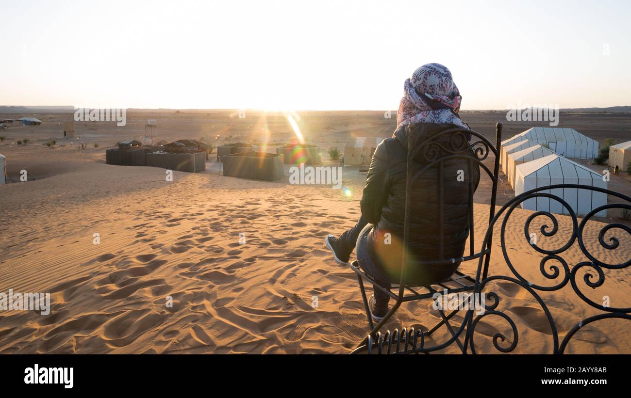 Woman in sahara desert at sunrise hi-res stock photography and images ...