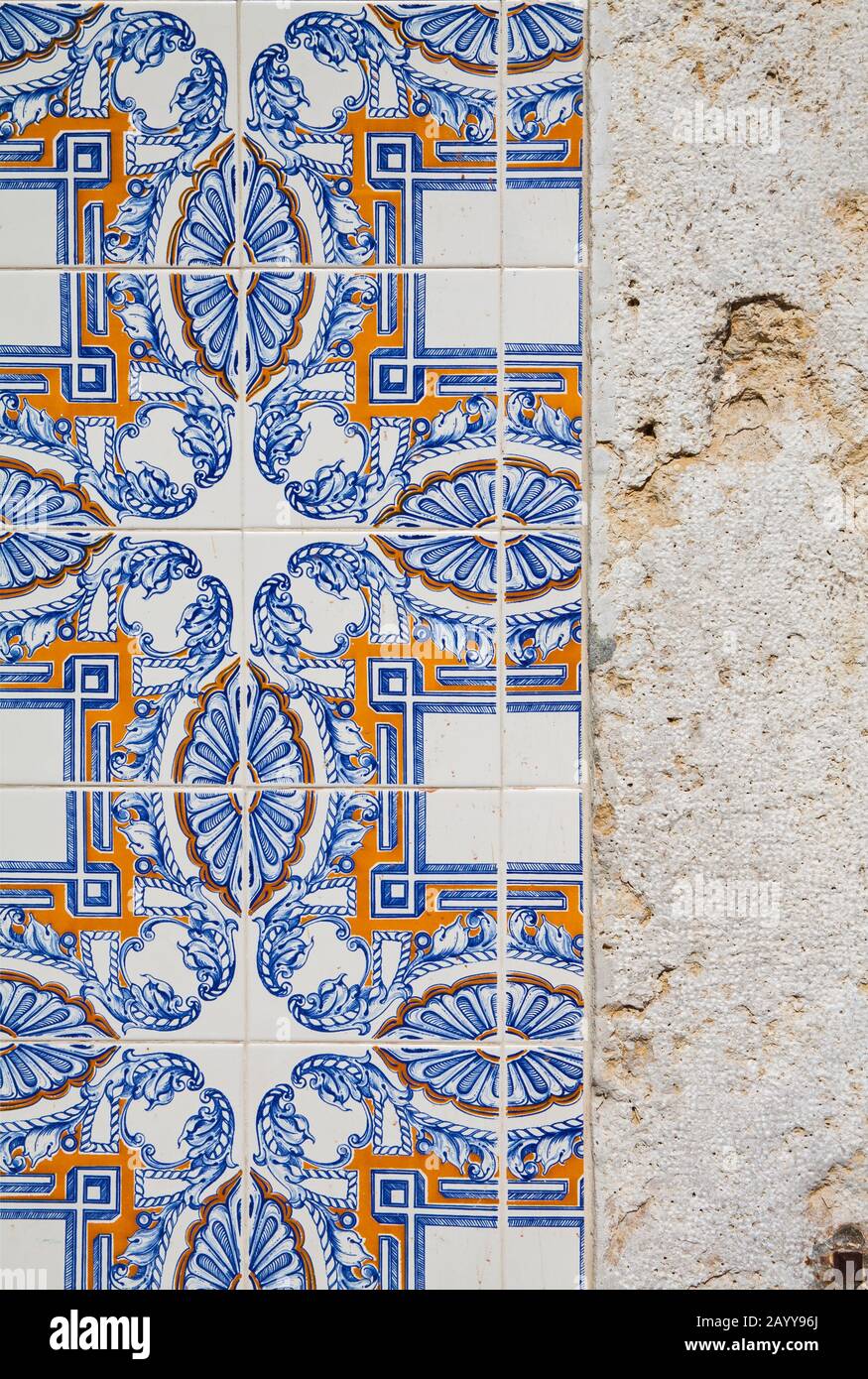 Detail of a building facade decorated with typical portuguese azulejo ...