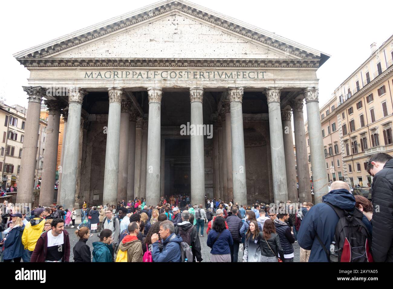 Crowds of tourist outside the Pantheon Rome Italy. Pantheon facade of  columns and the pediment.  Pantheon has the oldest surviving domed structure Stock Photo