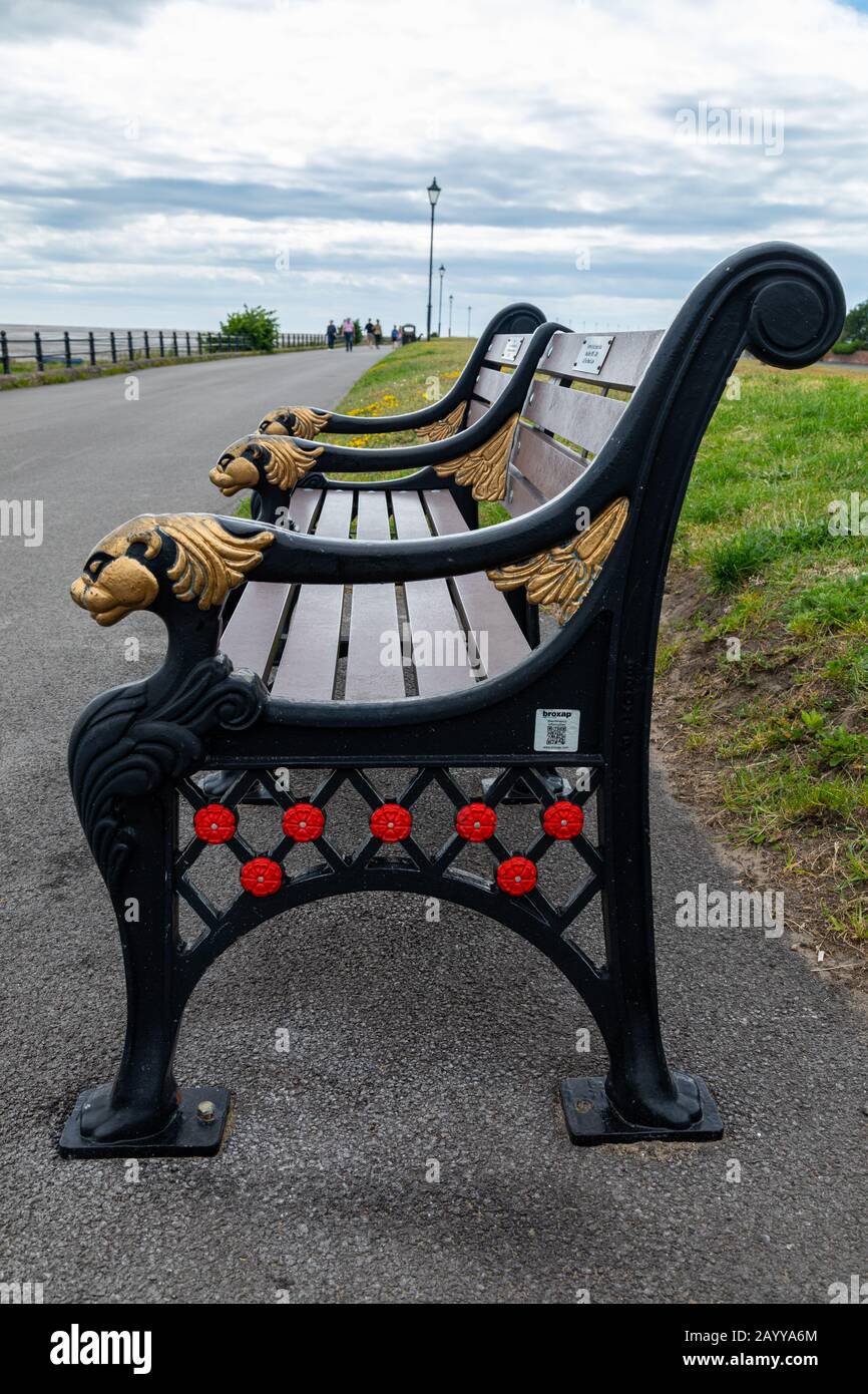 side view of wooden and cast iron bench at Lytham St Annes