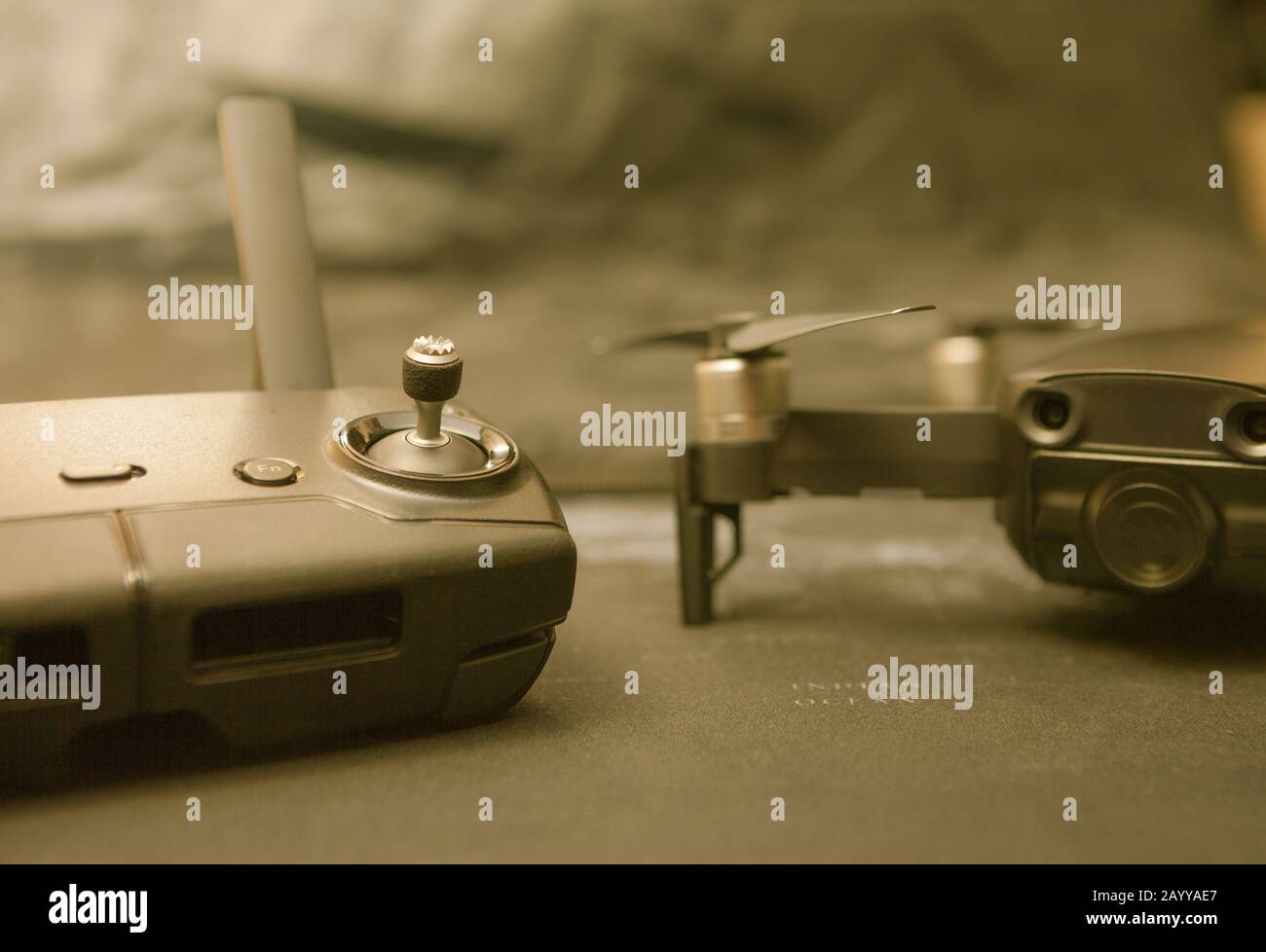 Remote controller and blurred copter in the background Stock Photo