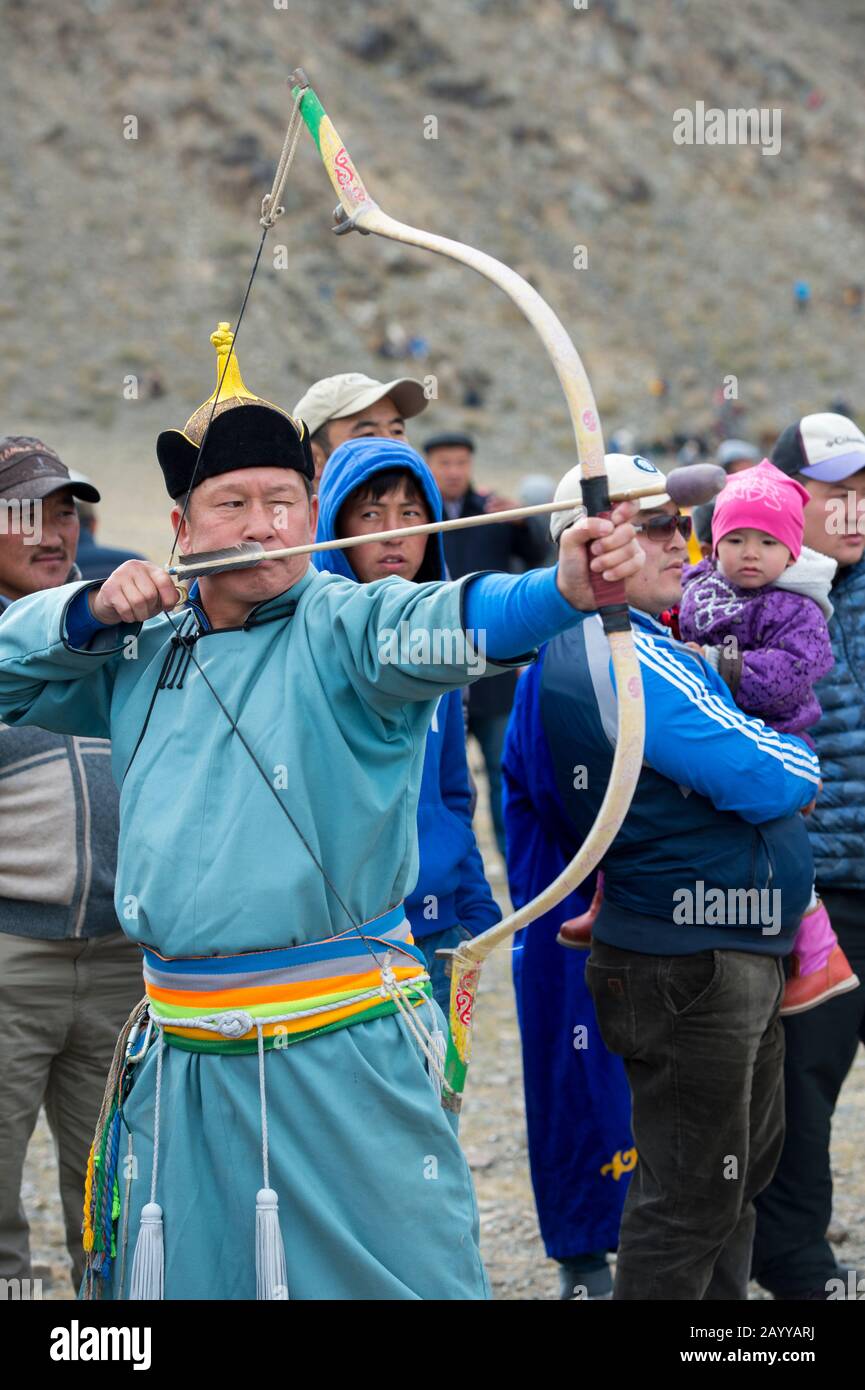 Archer aiming during archery competition at the Golden Eagle Festival